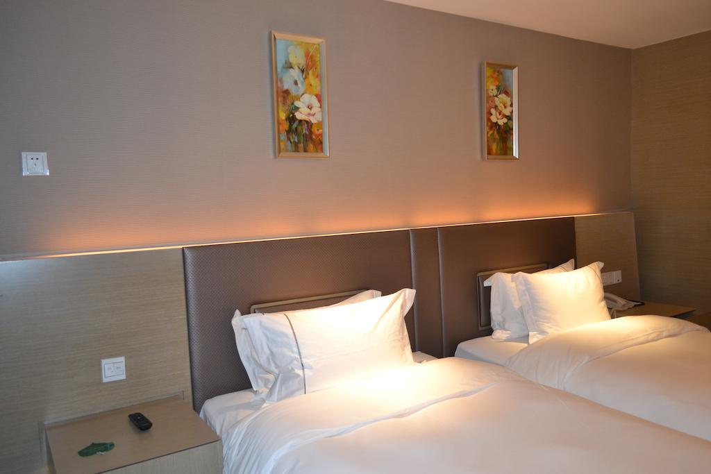 Angel Garden Hotel Hohhot Room photo